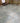 Aqua Kota Blue Limestone Paving; natural limestone paving slabs with cream jointing, back garden steps with decorative stones border and fencing