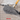 Concrete joint filler being applied with a trowel on a concrete surface, featuring the EASYJoint Select logo.