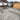 Celestial Rock Grey Porcelain Paving back garden paving tiles with outdoor living area and shed