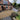 Brick house with a cerney gravel driveway and garden area