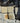 Stack of Weathered Yellow Limestone Cobbles Setts