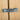 Metal door latch on a wooden door