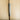 Metallic door handle on a wooden door; Pressure Treated