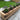 Wooden planter with lavender plants on a patio area
