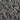 Close-up of small stones and pebbles in various shades of gray and green.
