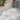 modern Patio area with celestial rock porcelain tiles, sliding glass door, and garden view.