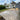 DISCOUNTED 'Natural' Sagar Black Porcelain Paving, 900 x 600, 12.31m - Only 1 Pack Available with fresh turf, decorative stones and mulch