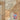 A collage of stone-look porcelain tile samples in warm beige, tan, and light brown tones, with a circular 'Stone Zone 15 Year Guarantee' badge in the lower right corner.