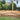 Decking patio with turf area; outdoor living area