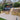 Backyard with playground equipment, garden, and small building with Pine Softwood Sleepers