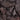 Close-up of dark purple and gray stones