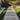 Garden pathway with dark grey cobbles, Polar White stones and sienna cappuccino, cream paving stepping stones