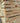 Stack of wooden oak sleepers on a pallet outdoors