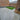 Quartzite Grey Porcelain Paving slabs in the back garden with turf and cladding