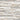 Pattern of stacked stone tiles in various shades of gray and beige.