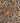 VUBA Resin Kit, Milano Marble; Close-up of multicoloured resin bound aggregates with red, grey, and black hues.