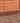 Gravel Board - 1.83m lining wooden fence panels in garden with decorative aggregates