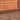 Gravel Board - 1.83m lining wooden fence panels in garden with decorative aggregates