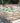 golden fossil sandstone walling pieces with soil and flowers