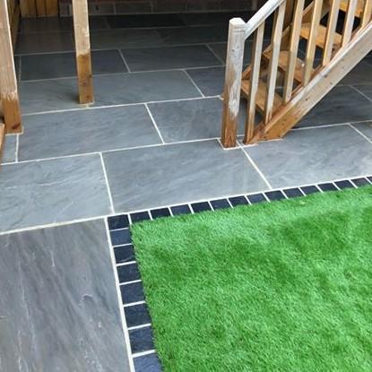 Carbon Limestone Cobble Setts, Calibrated with paving and artificial grass
