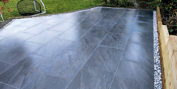 black paving slabs with dec stones